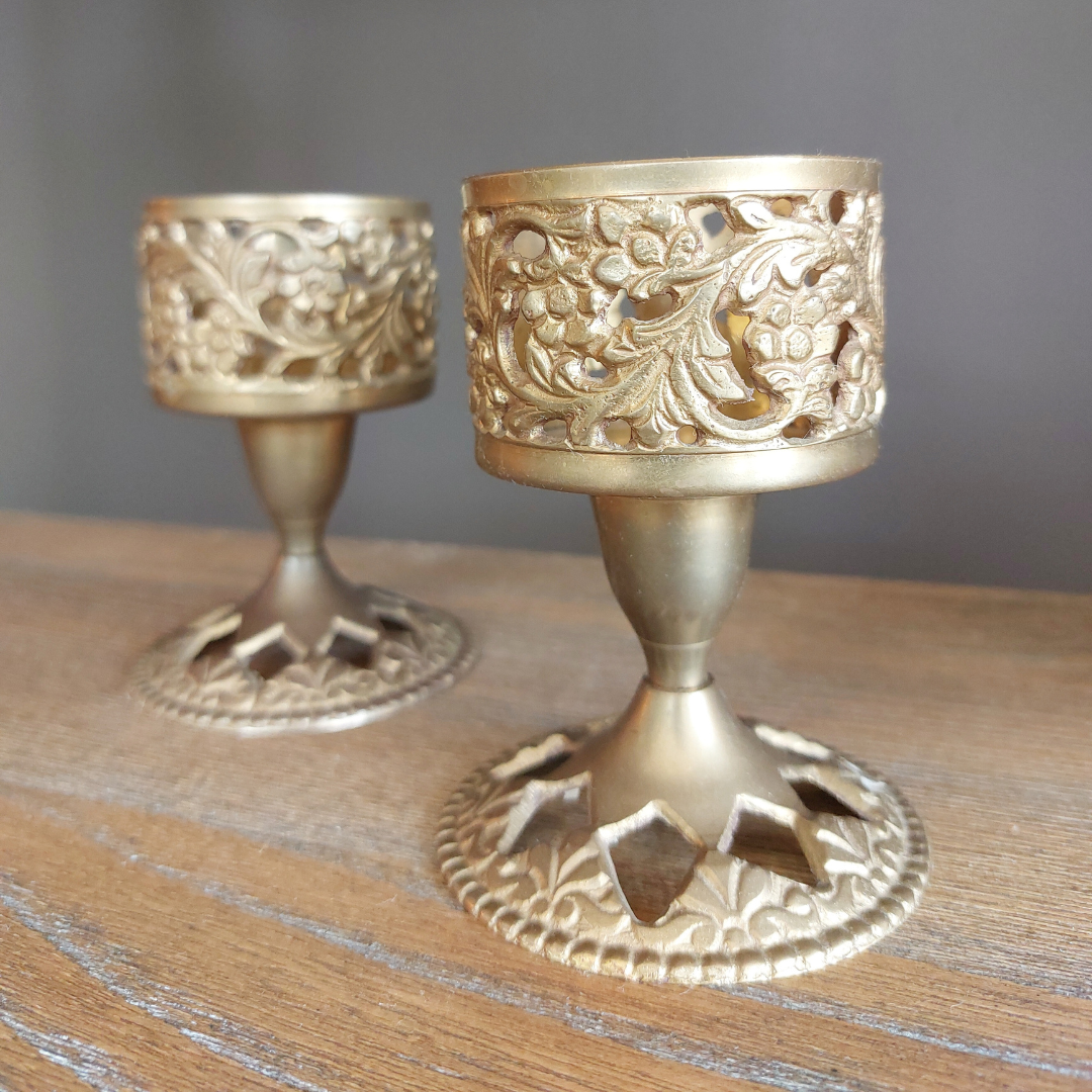 brass carved candleholders