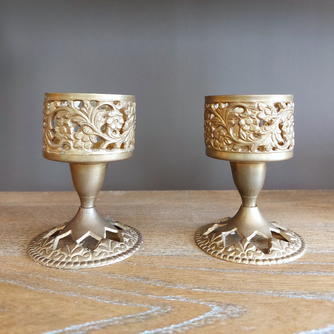 brass carved candleholders