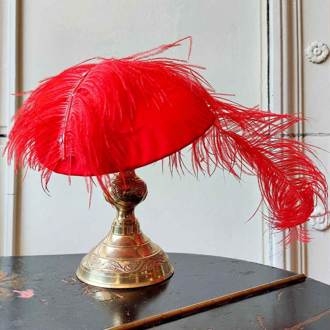Red Fascinator with red feather plume