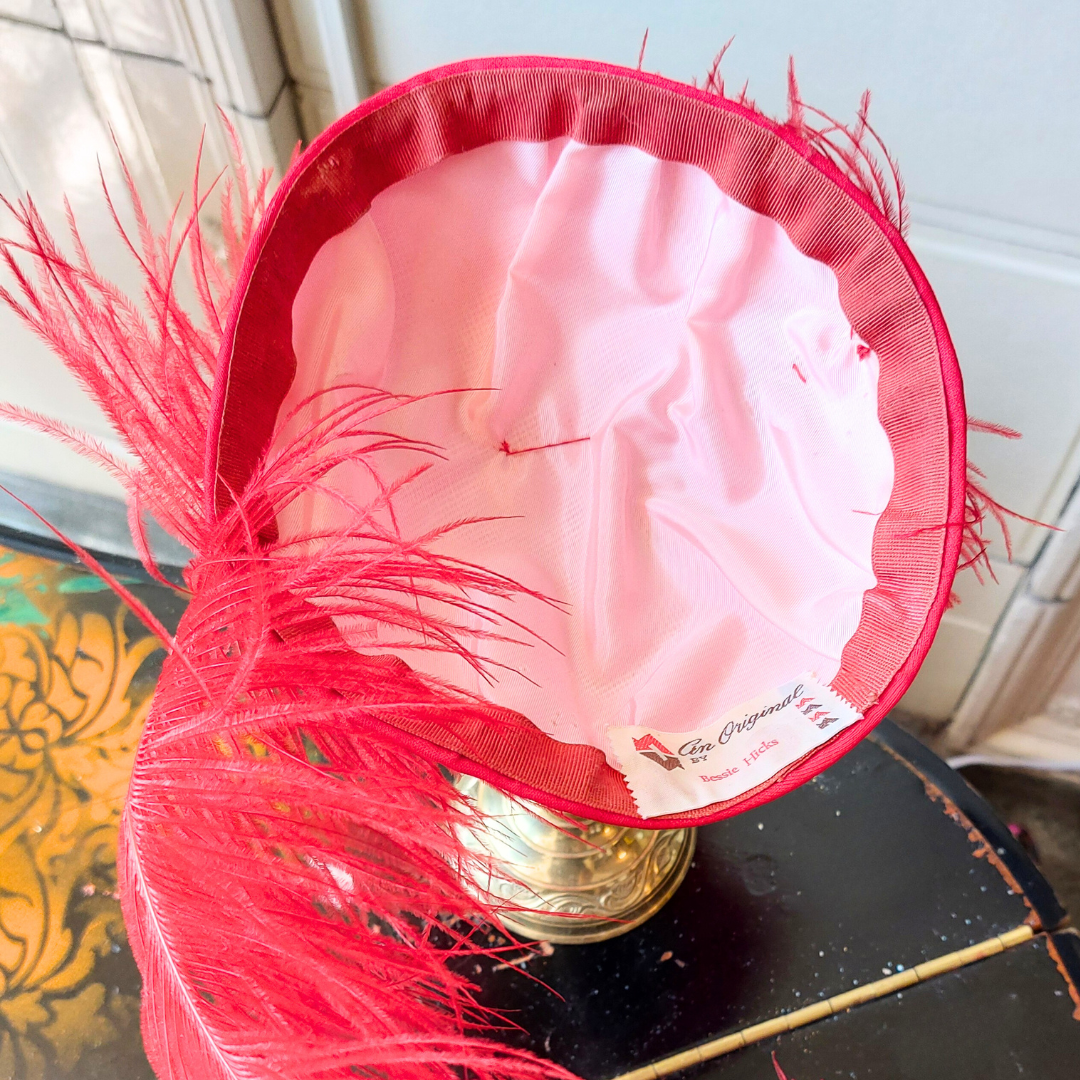 Red Fascinator with red feather plume